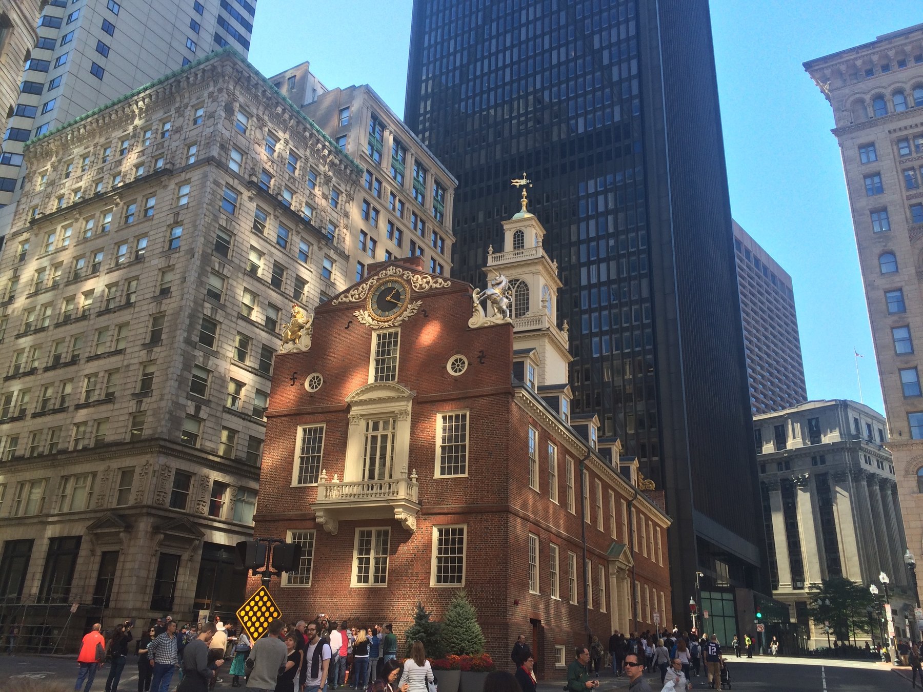 The Old State House on State Street surrounded by office towers in Boston's Financial District